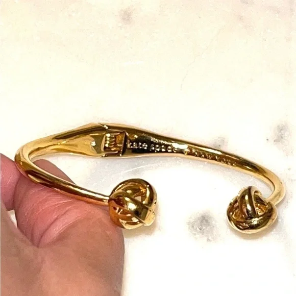 𝅺Kate Spade Knot Hinged Gold Open Bangle Cuff - Picture 5 of 5